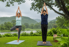 Malaria Prevention - People practicing yoga outdoors during monsoon to support immunity and wellness.