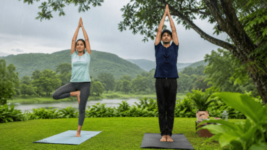Malaria Prevention - People practicing yoga outdoors during monsoon to support immunity and wellness.