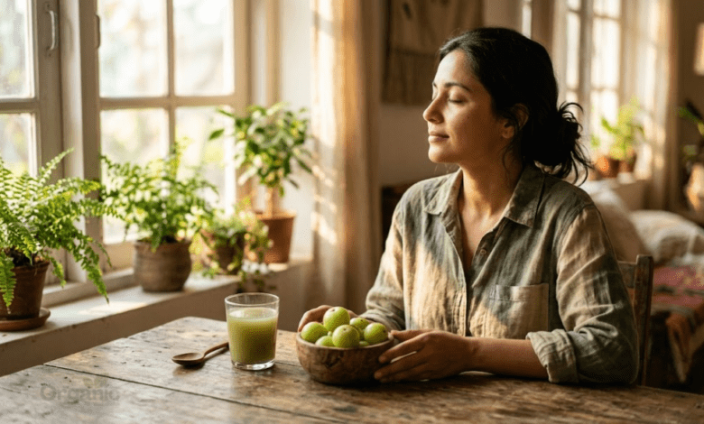 Fresh amla (Indian gooseberries) in a wooden bowl with amla juice, representing Amla health benefits for eye care and wellness
