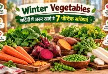 Winter Vegetables including spinach, carrots, beetroot, sweet potatoes, white radish, mustard greens and green peas arranged on a table.